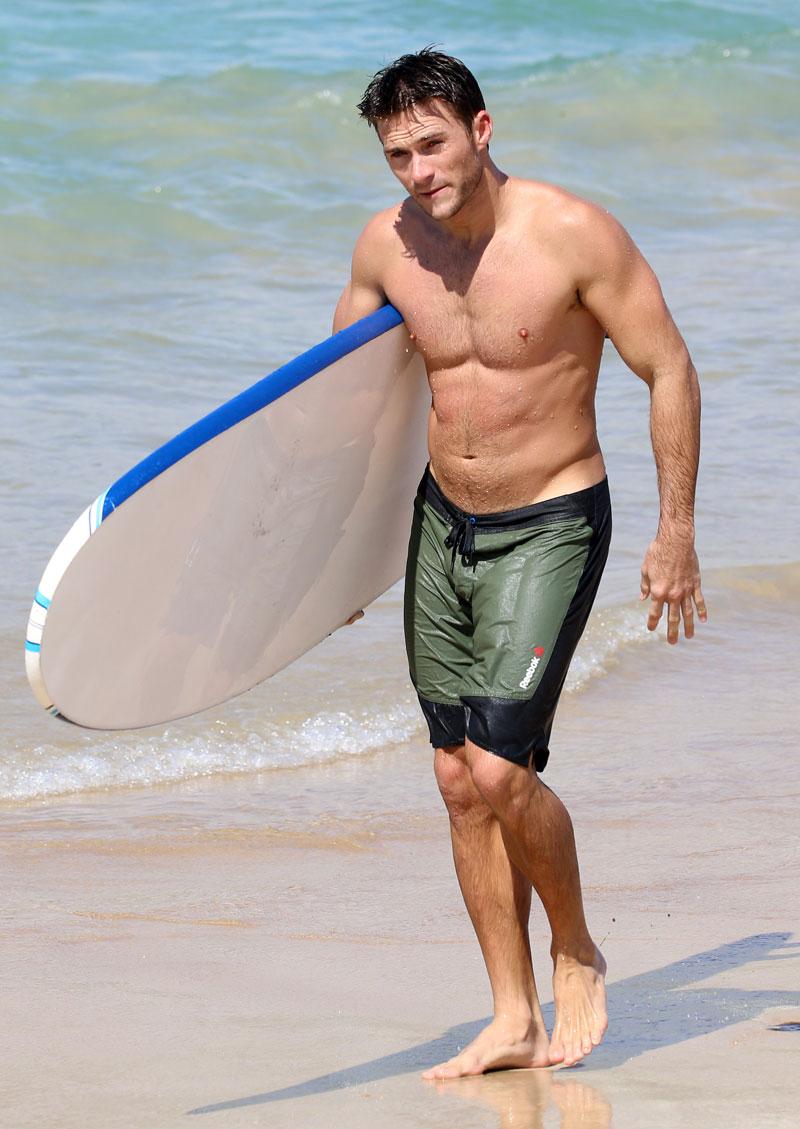 Scott Eastwood Shirtless Surfing Beach Pics