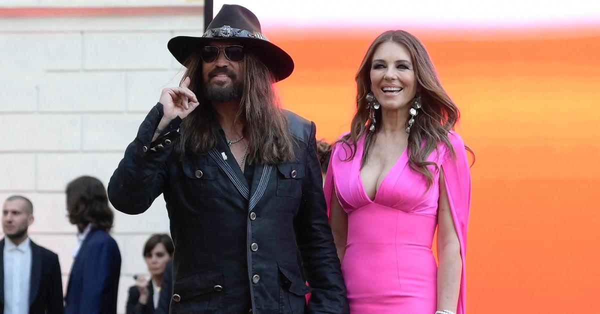 Image for article EXCLUSIVE Elizabeth Hurley and Billy Ray Cyrus Planning to Capitalize on the Attention Their Bizarre Romance is Getting and Cash in on Sexy New Business Deals