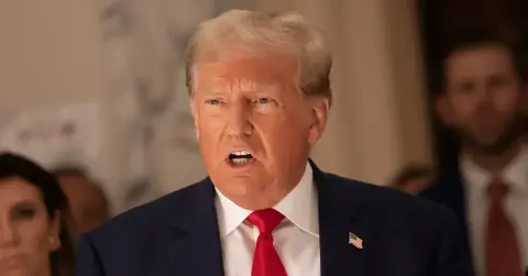 donald trump refuses to answer questions on dictator remarks sean hannity town hall million fraud lawsuit