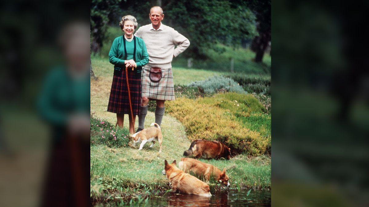 Photo of Queen Elizabeth and Prince Philip with their corgis