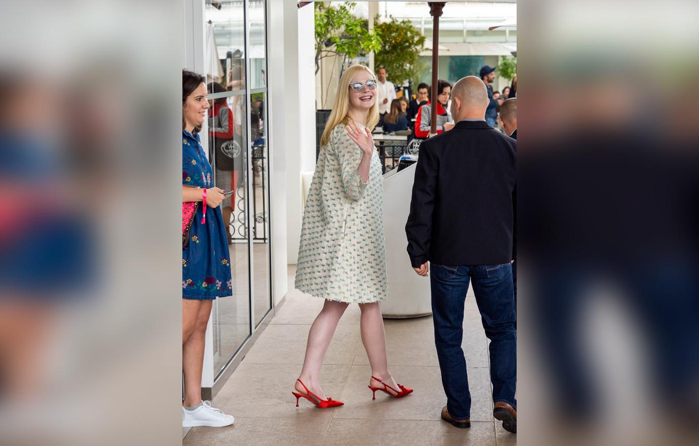 elle fanning giant dress fainting cannes