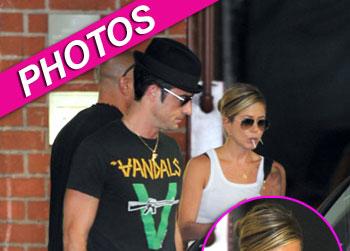 //jennifer aniston justin theroux beverly hills npg