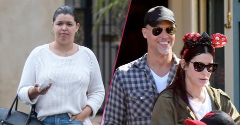 Skylar Staten was later seen heading out for lunch with a friend wearing a slouchy sweatshirt, jeans and colorful sandals while carrying a black oversized handbag. Right, Bryan Randall with Sandra Bullock at Disneyland.