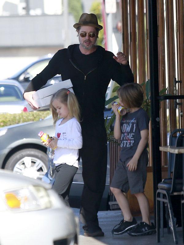 Brad Pitt Photos -- Actor Sports Black Eye Taking Out Twins Vivienne and Knox