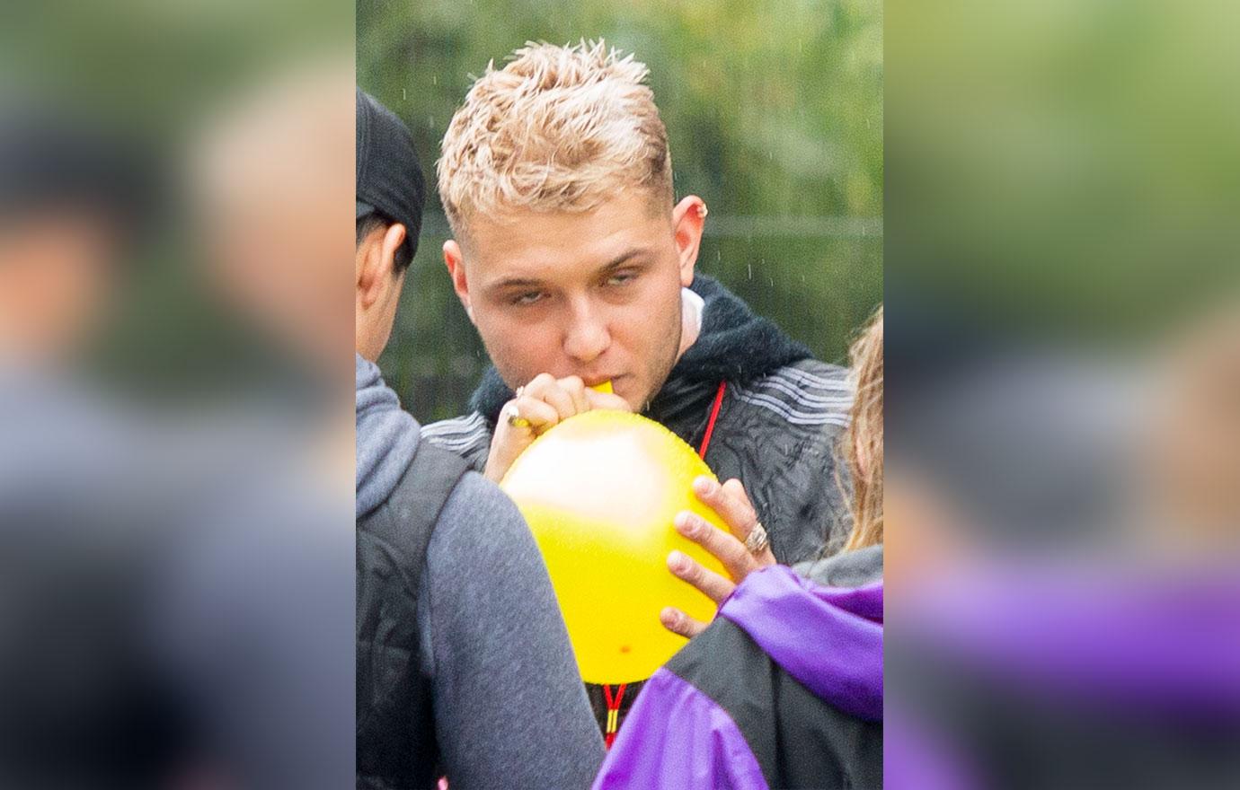 Jude Law's Son Rafferty Inhales Balloon At Carnival