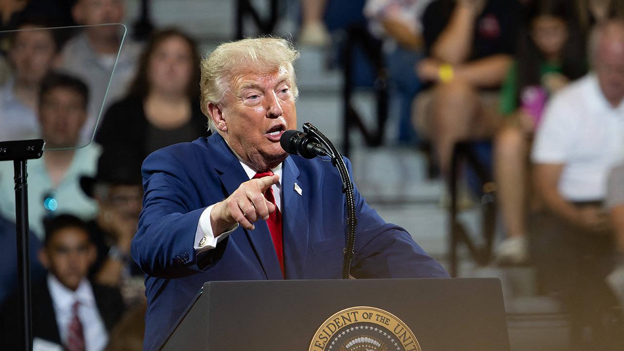 A protester chanted 'pedophile protector' during Trump's speech.