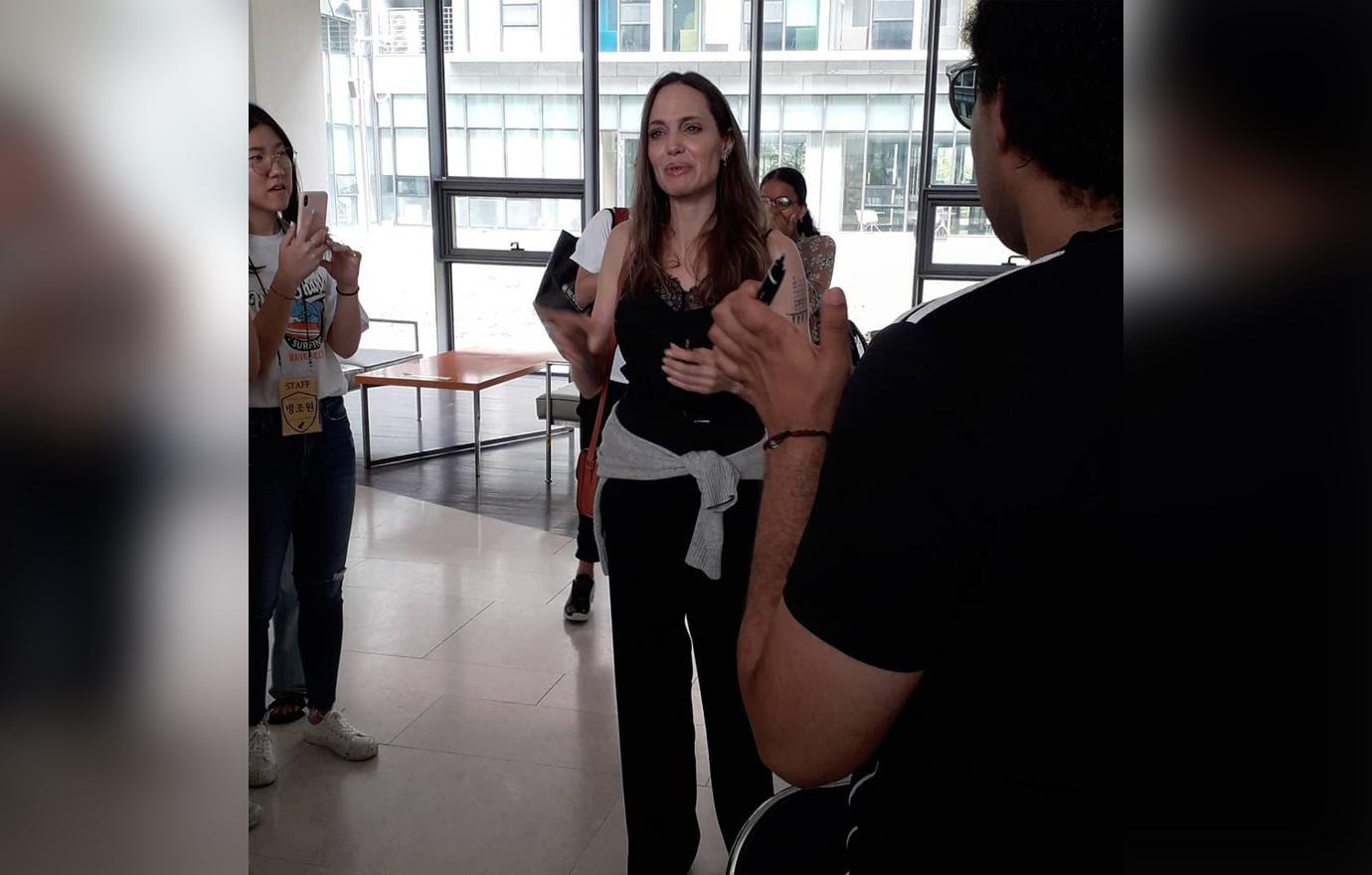 Angelina Jolie Inside School in South Korea Speaking Surrounded by Fans