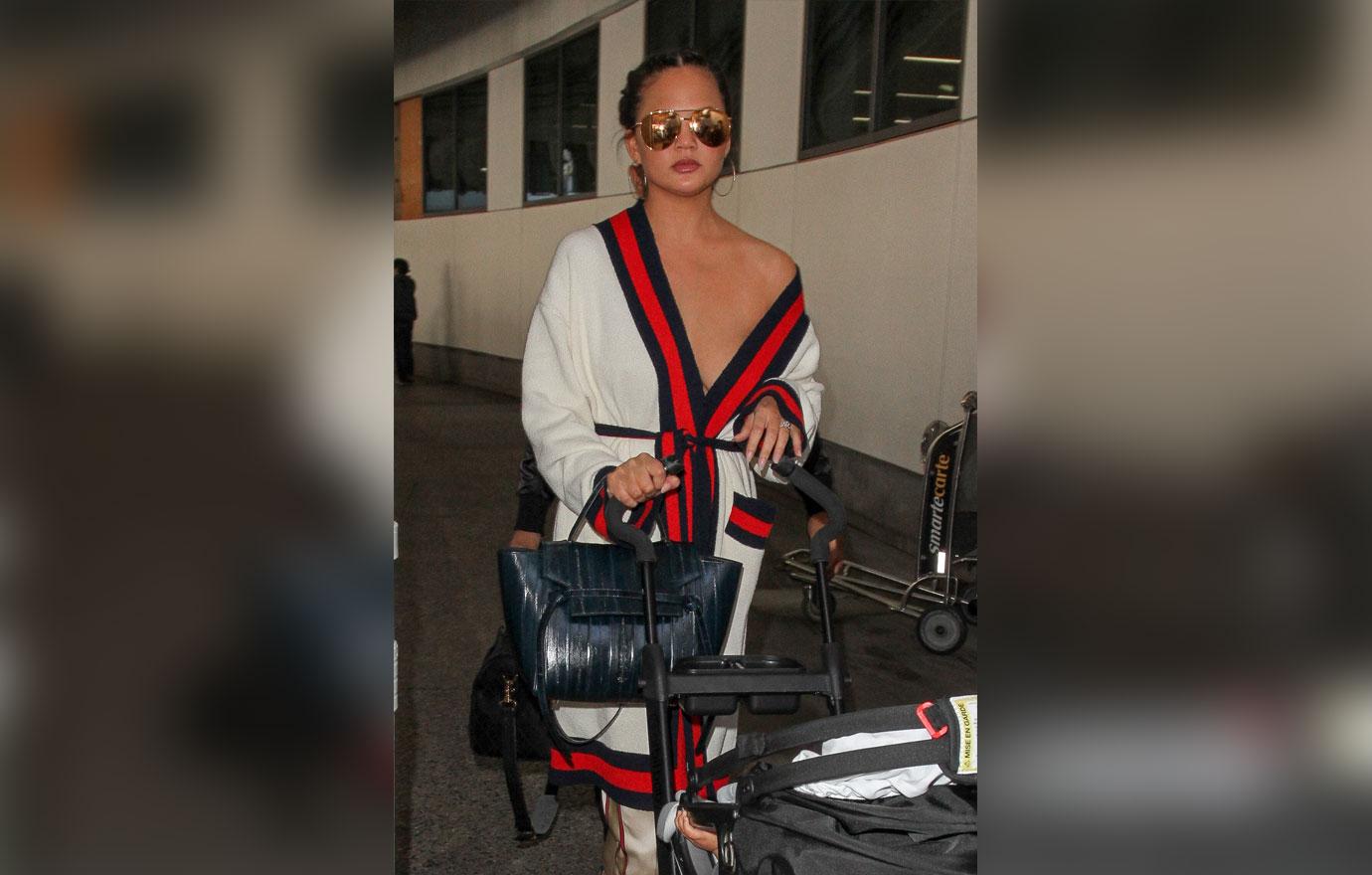 [pics] Chrissy Teigen Suffers Nip Slip In Gucci Robe