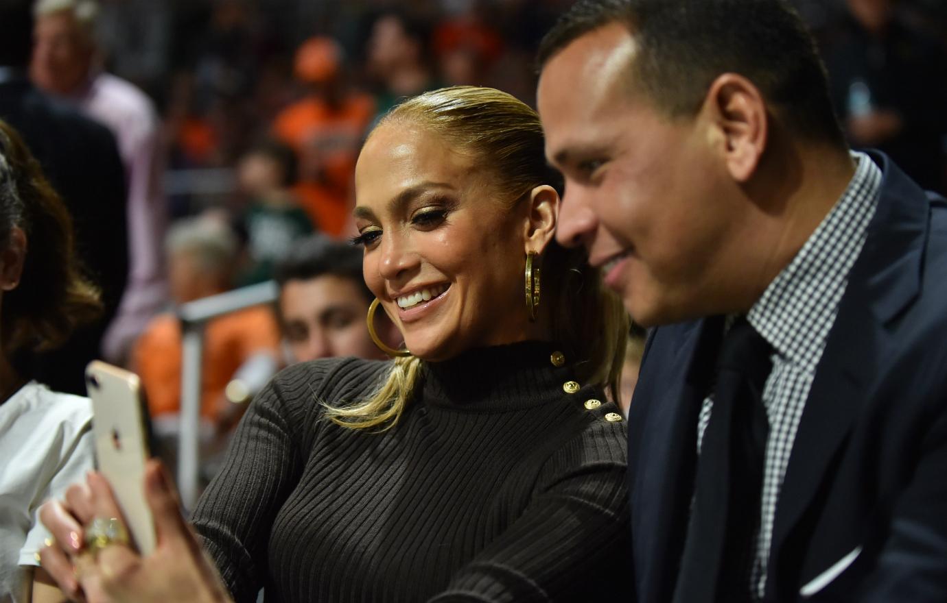 Former New York Yankees third baseman Alex Rodriguez and recording artist Jennifer Lopez attend the basketball game between the Duke Blue Devils and the Miami Hurricanes at The Watsco Center on January 15, 2018 in Miami, Florida.