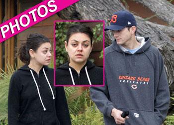 //mila kunis no makeup dog