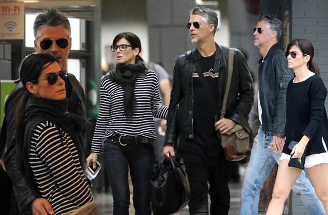 //sandra bullock bryan randall move in date holding hands pp