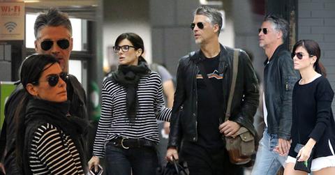 //sandra bullock bryan randall move in date holding hands pp