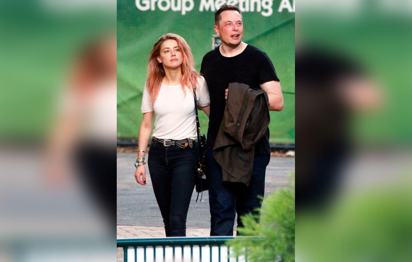 //amber heard elon musk dating holding hands