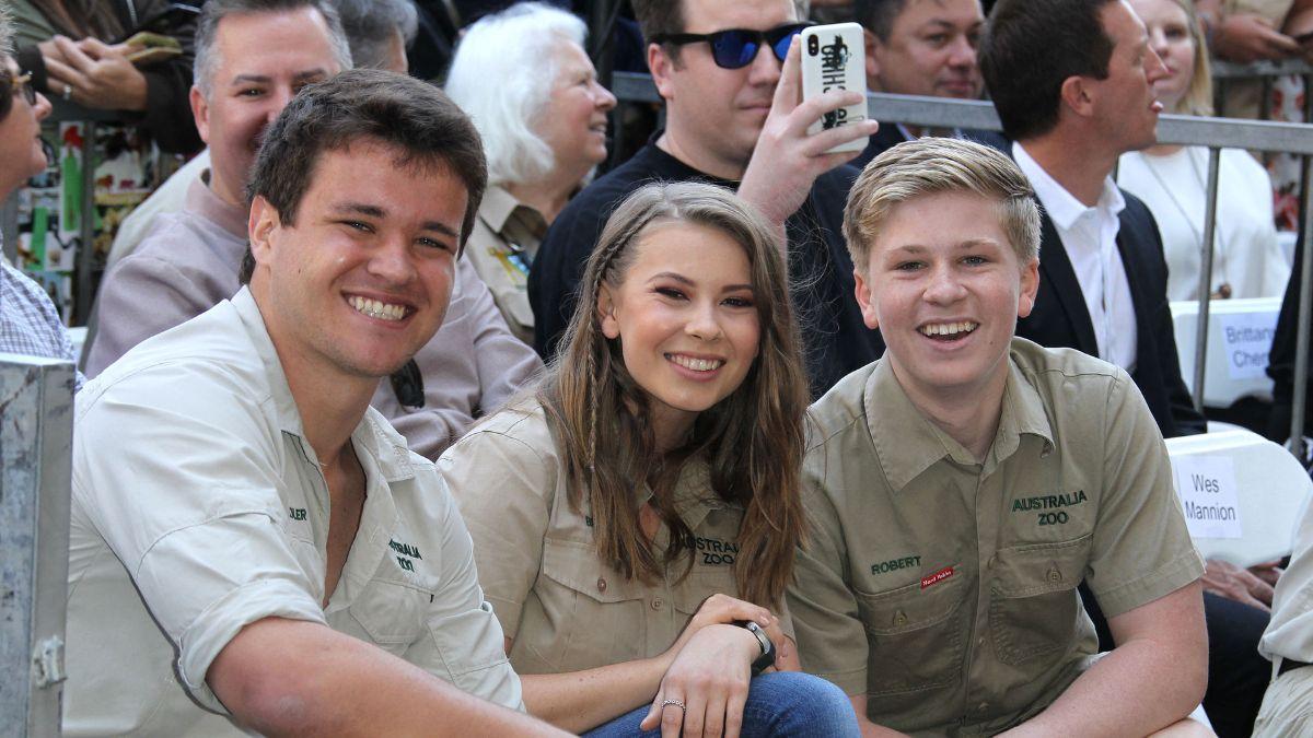 Sources said Bindi Irwin feels caught between her husband, Powell and brother Robert as tensions rise over work and family loyalty.