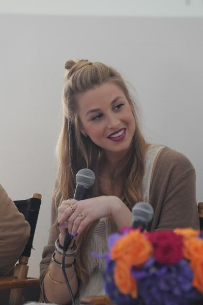 //whitney port wearing charmed circle while speaking at the simply stylist panel