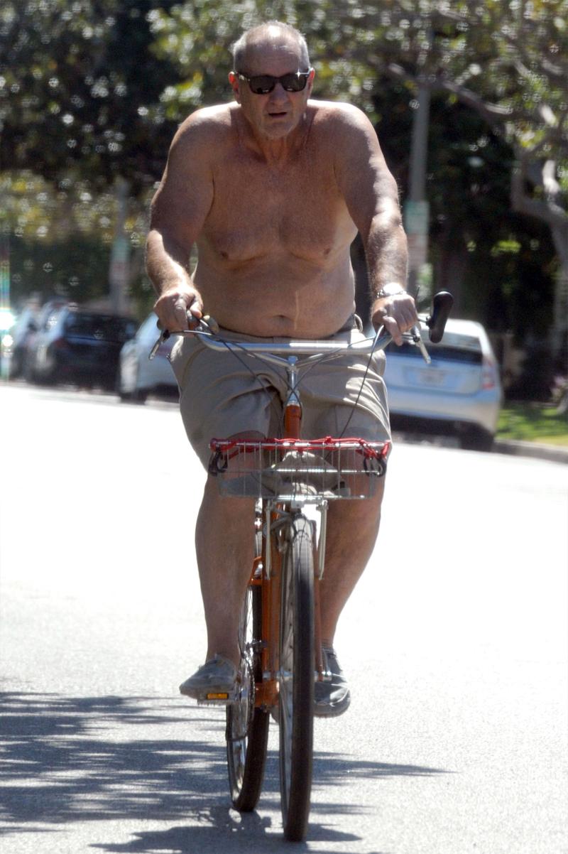 //ed o neill shirtless weight bike ride