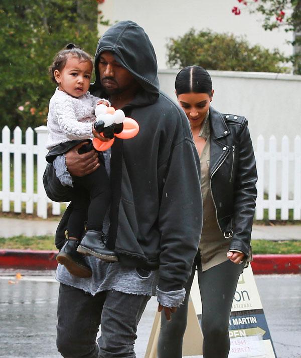 Daddy's Girl! Kanye West Dotes On North As He Carries Her Out Of A ...