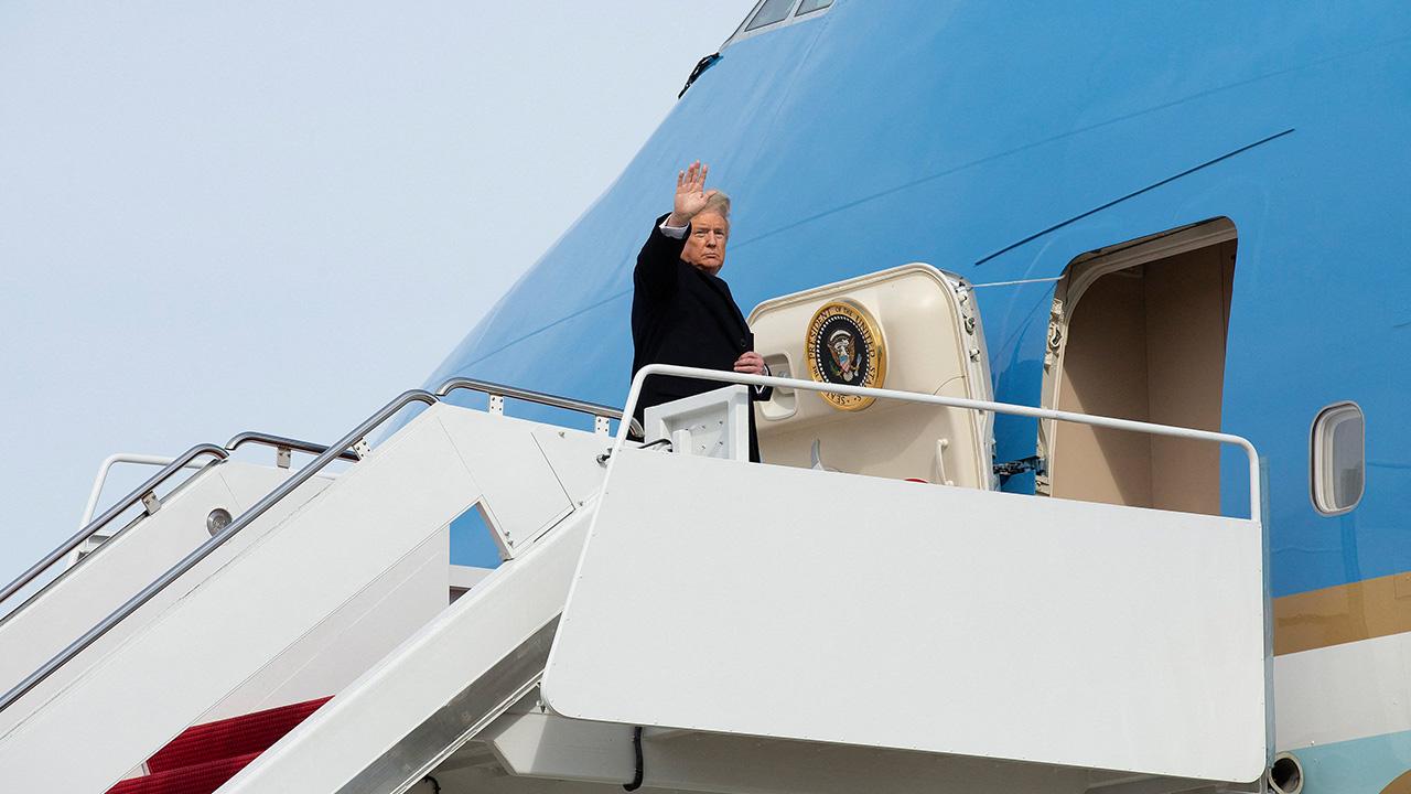 The president was secretly shuttled to another jet after fears of a terrorist attack.