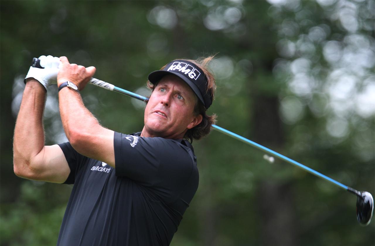 //phil mickelson hits moving golf ball with putter pp