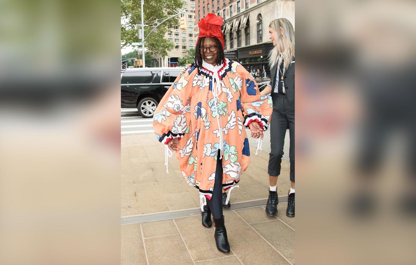 whoopi goldberg crazy outfit red hat new york