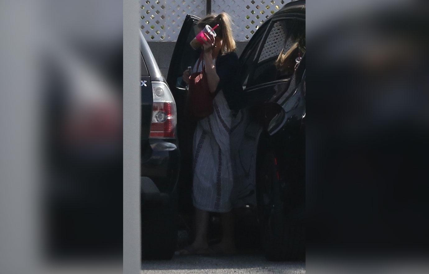 Cameron Diaz Desperately Trying To Hide Baby Bump In Grotesquely Oversized Clothes