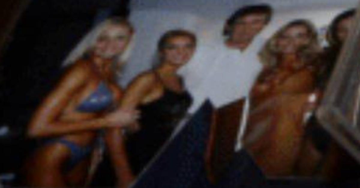 Photo of Donald Trump with bikini-clad women