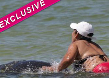 //woman rides manatee florida