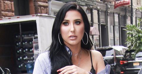 Surprised Looking Jaclyn Hill on the Street Wearing Blue And White Striped Shirt Dress