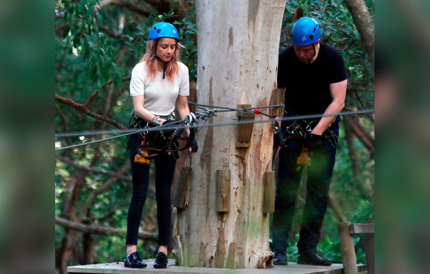 //amber heard elon musk dating holding hands