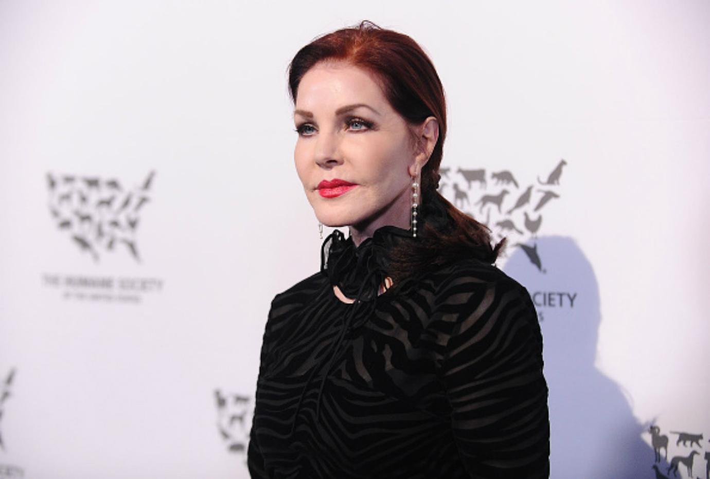 Priscilla Presley poses on the red carpet.