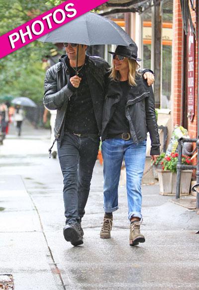 //jennifer aniston justin theroux rain nyc inf