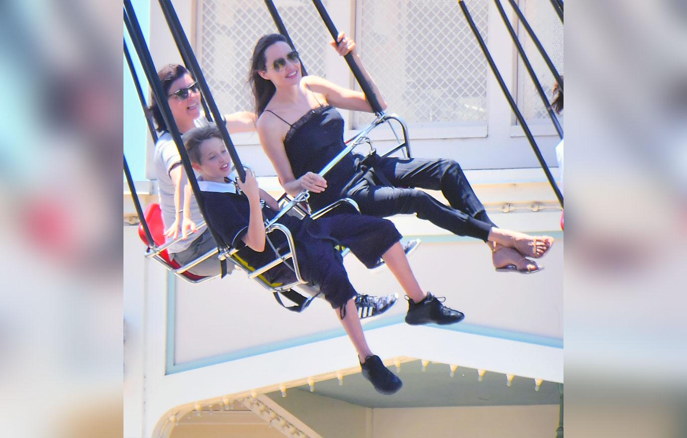 //skinny Angelina jolie twins birthday disneyland