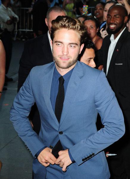 Robert Pattinson arrives at the premiere of "Cosmopolis" in his first public appearance since his split from Kristen Stewart