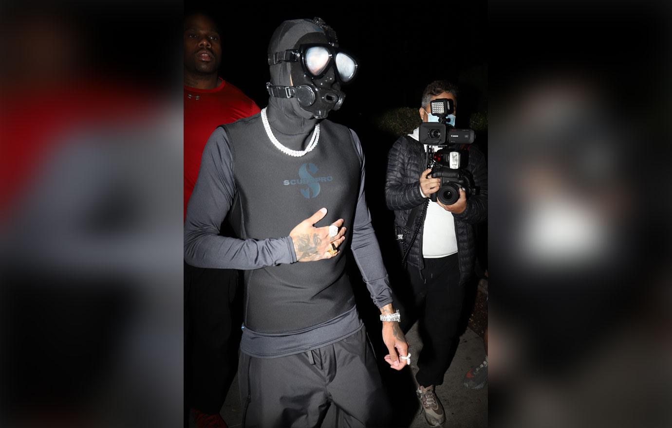 tyga gas mask photos la nightclub days after domestic violence arrest