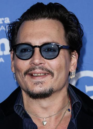 Former Sex Symbol Johnny Depp Spotted With Yellow Teeth