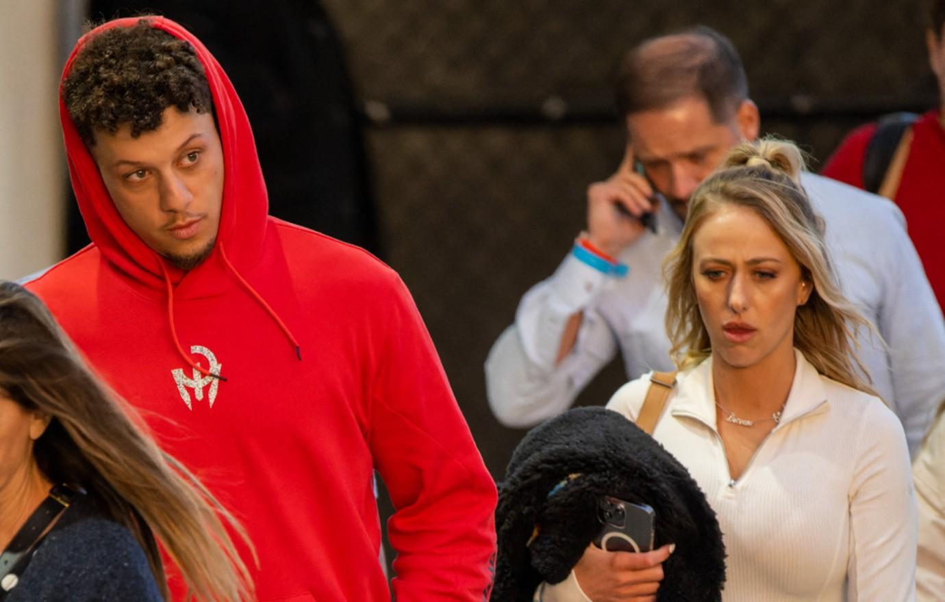 Patrick Mahomes Wears Daughter in Hiking Backpack Ahead of Family Travels