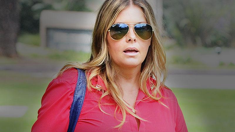 Splash star Nicole Eggert's battered and bruised back after