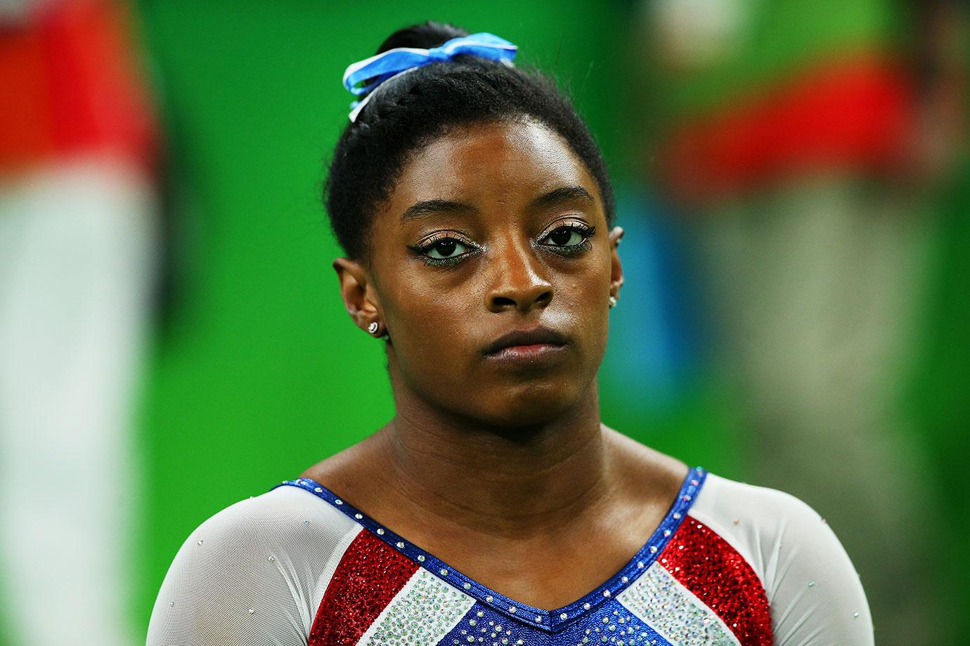 simone biles troubled childhood dad evicted sister car accident dwts