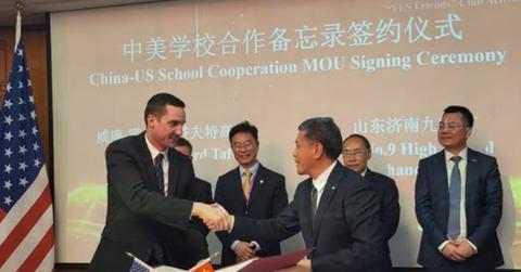 A photo of representatives from Taft High School and Shandong Jinan No. 9 High School