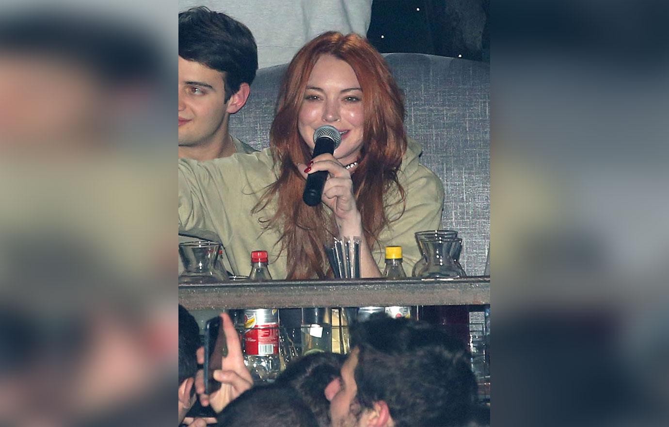 //lindsay lohan drunk party greece man pda