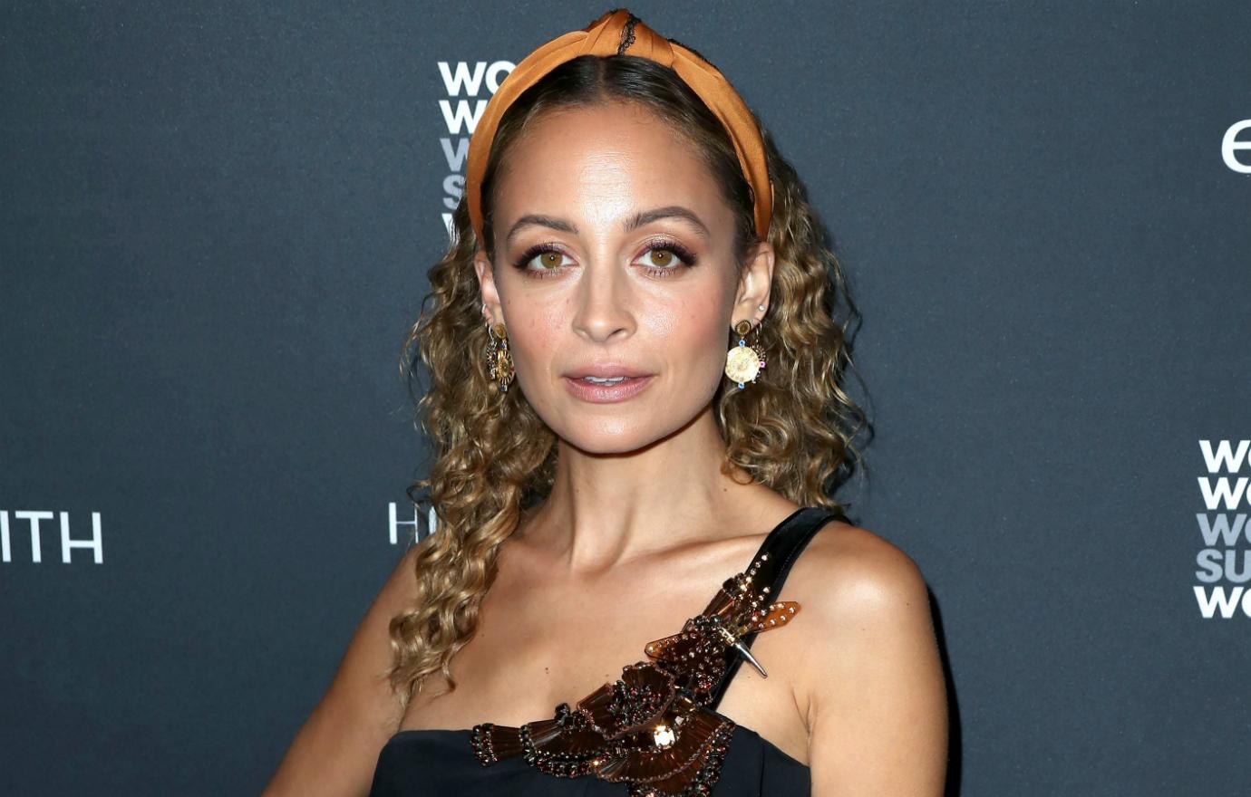 Nicole Richie walked the red carpet at a Yahoo Lifestyle event in a single strap black gown.