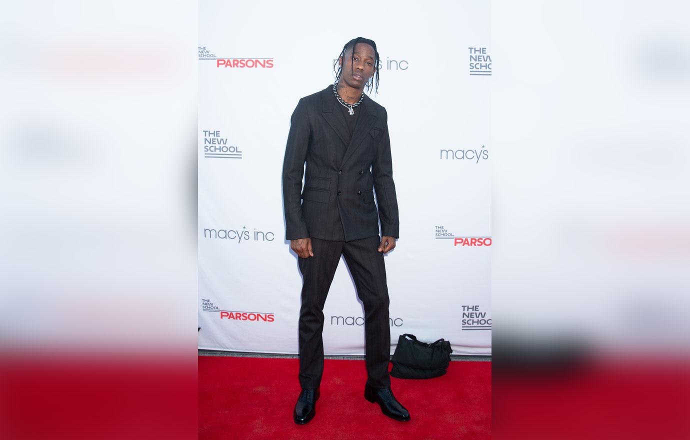 travis scott harassed by protestor outside texas mansion astroworld deaths lawsuit