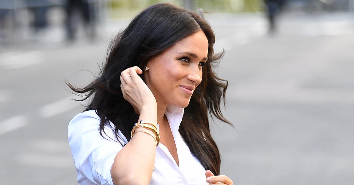 pregnant spotted meghan markle first photos archie ambushed family meeting