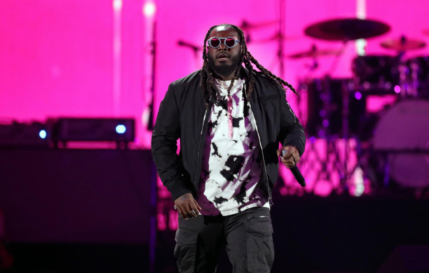 T-Pain performs on stage.