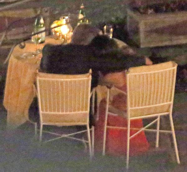 //george clooney amal clooney dinner italy kiss hold hands