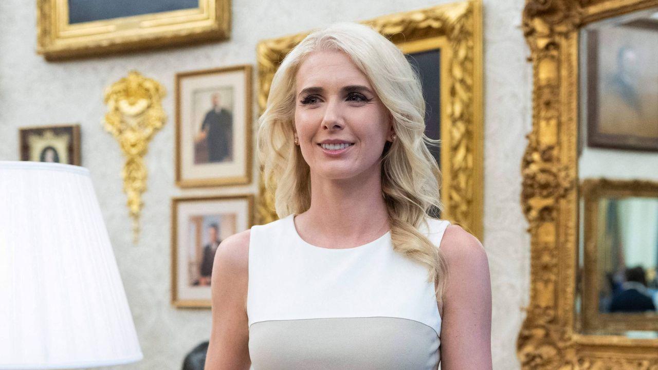 image of Natalie Harp wrote, 'We will never give up. We will never concede!' during Donald Trump's speech.