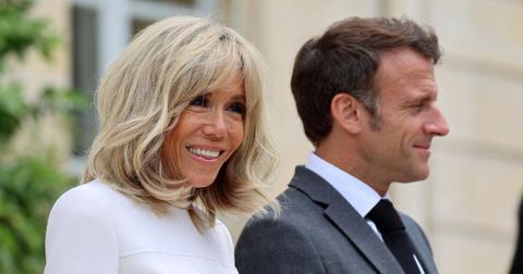 french president macron denounces transgender rumors wife