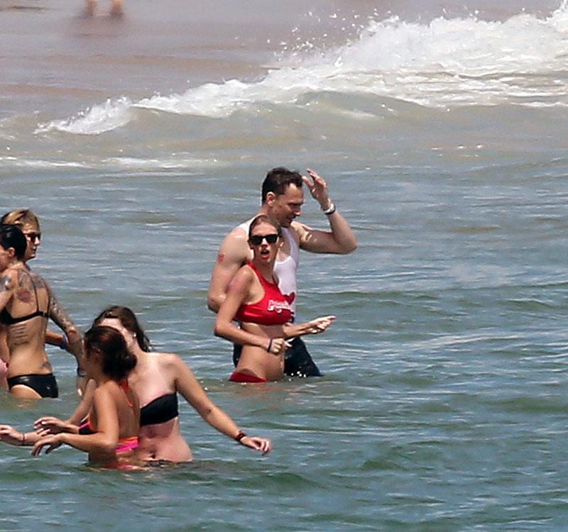 Tom Hiddleston Meets Taylor Swift's Bikini-Clad Squad -- Photos