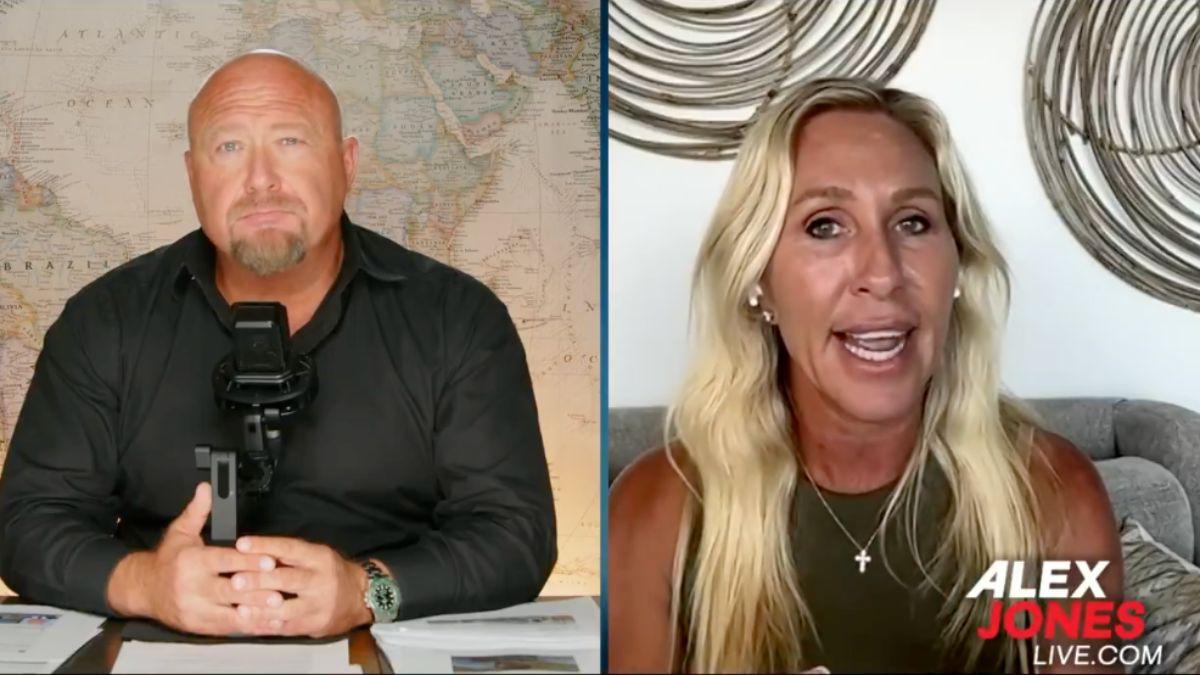 Photo of Alex Jones and Marjorie Taylor Greene