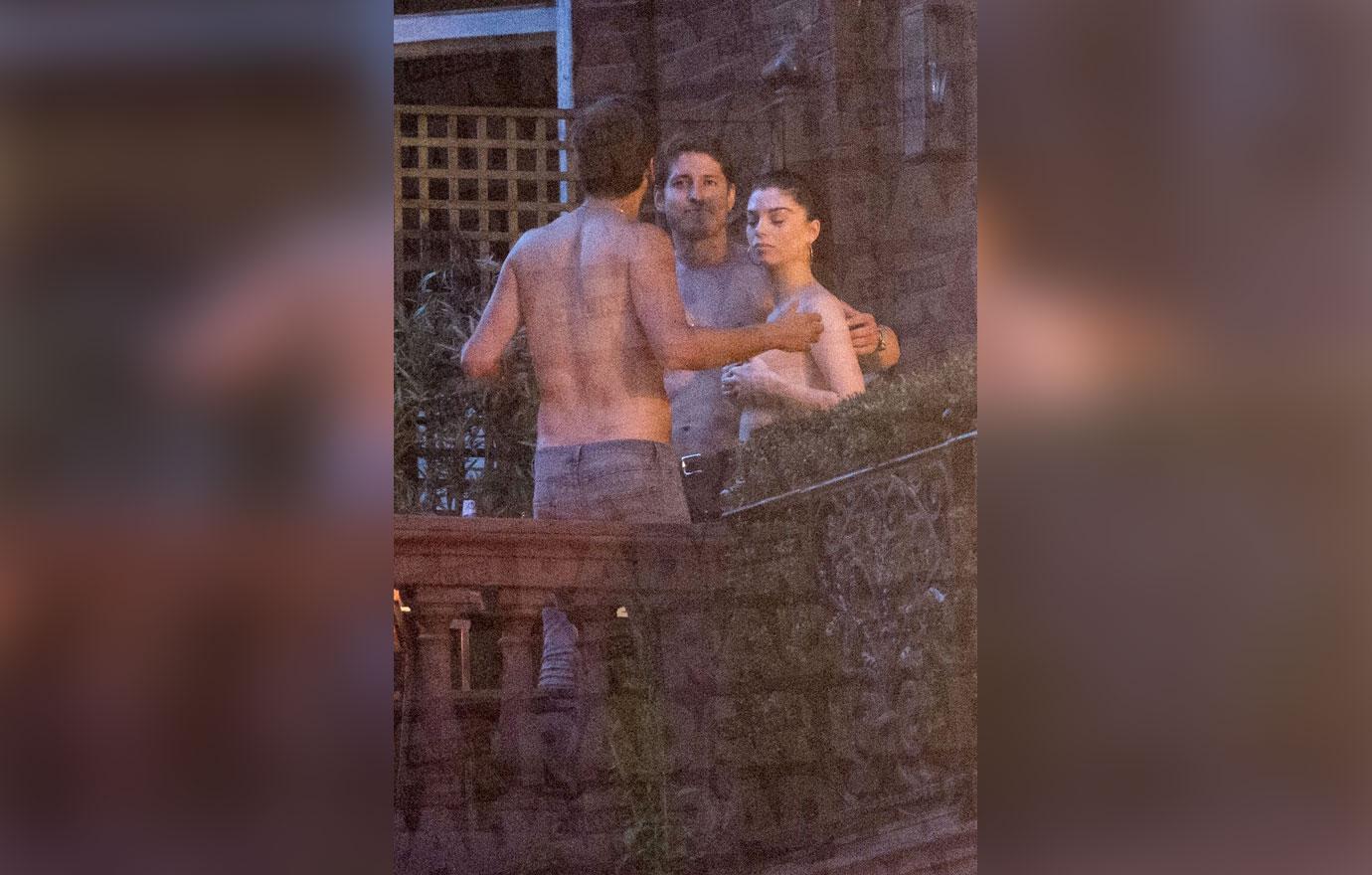 //scott disick shirtless woman topless balcony london